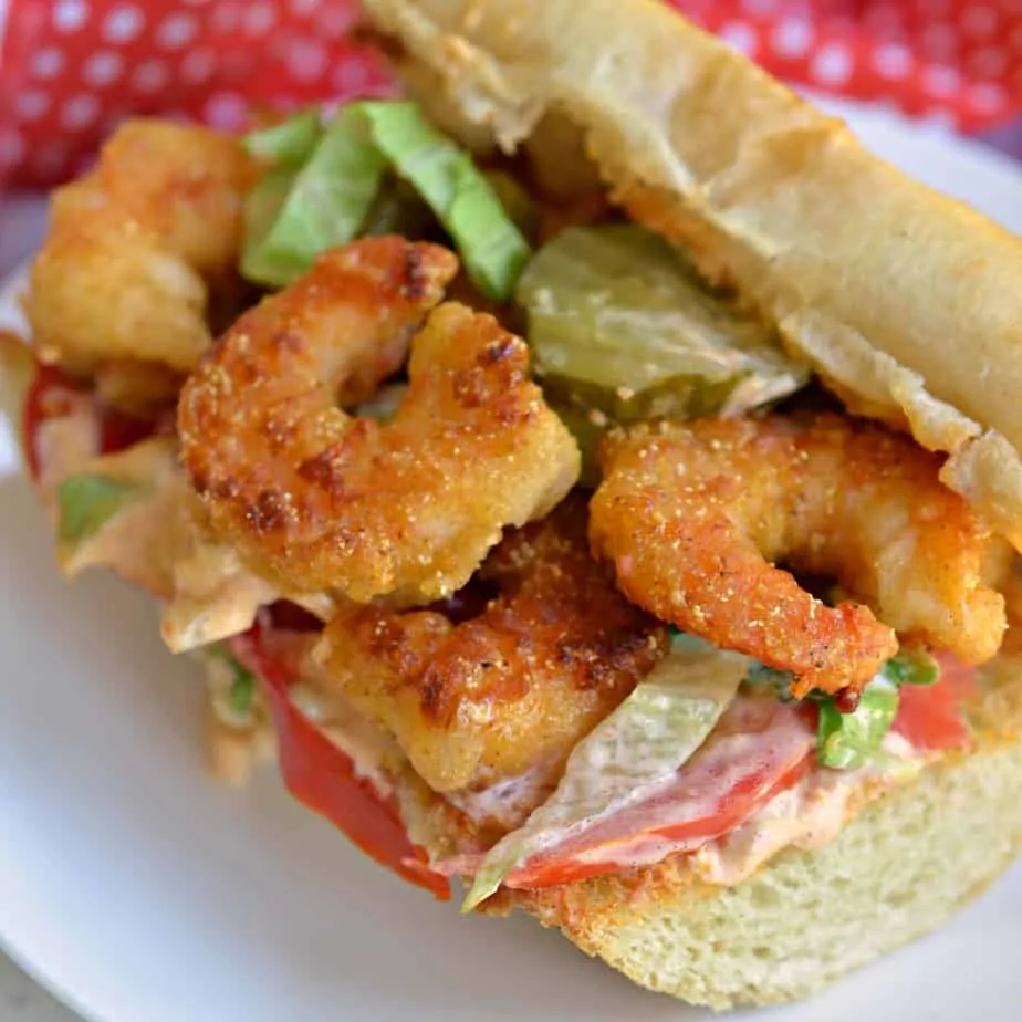 A taste bud awakening Shrimp Po Boy with extra crispy Cajun fried shrimp drizzled with a sassy remoulade sauce. 