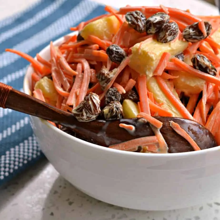 Carrot Raisin Salad goes with so many main courses but it is particularly delicious with Oven Baked Ribs.