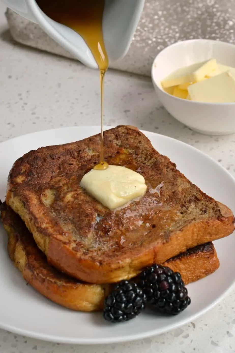 This French Toast Recipe brings brioche bread, eggs, milk, cinnamon, nutmeg, together for the ultimate breakfast. 