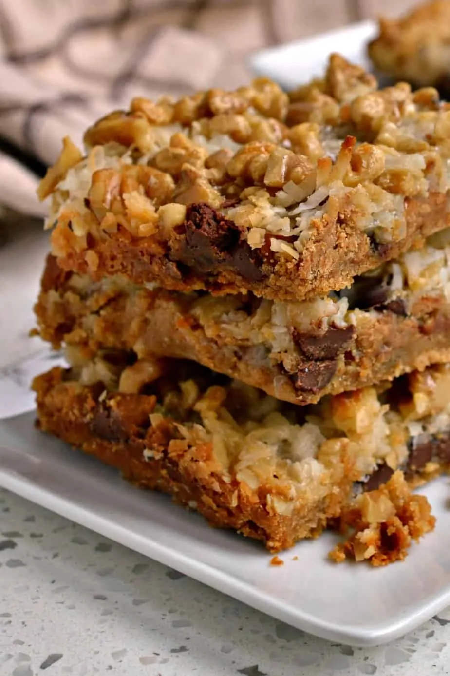 Fun, easy and delectable these Magic Cookie Bars will be a hit at your next party, potluck or family reunion.
