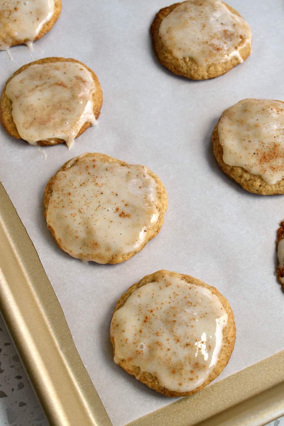 You are going to love these easy Eggnog Cookies topped with a light eggnog glaze and a sprinkling of nutmeg and cinnamon. 