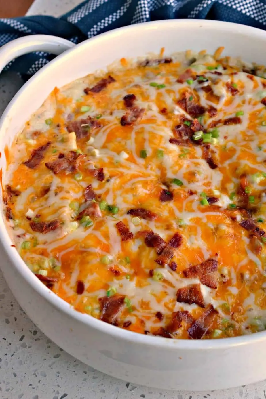 Puffy potato dumpling casserole with alfredo sauce, bacon and oodles of cheese. 