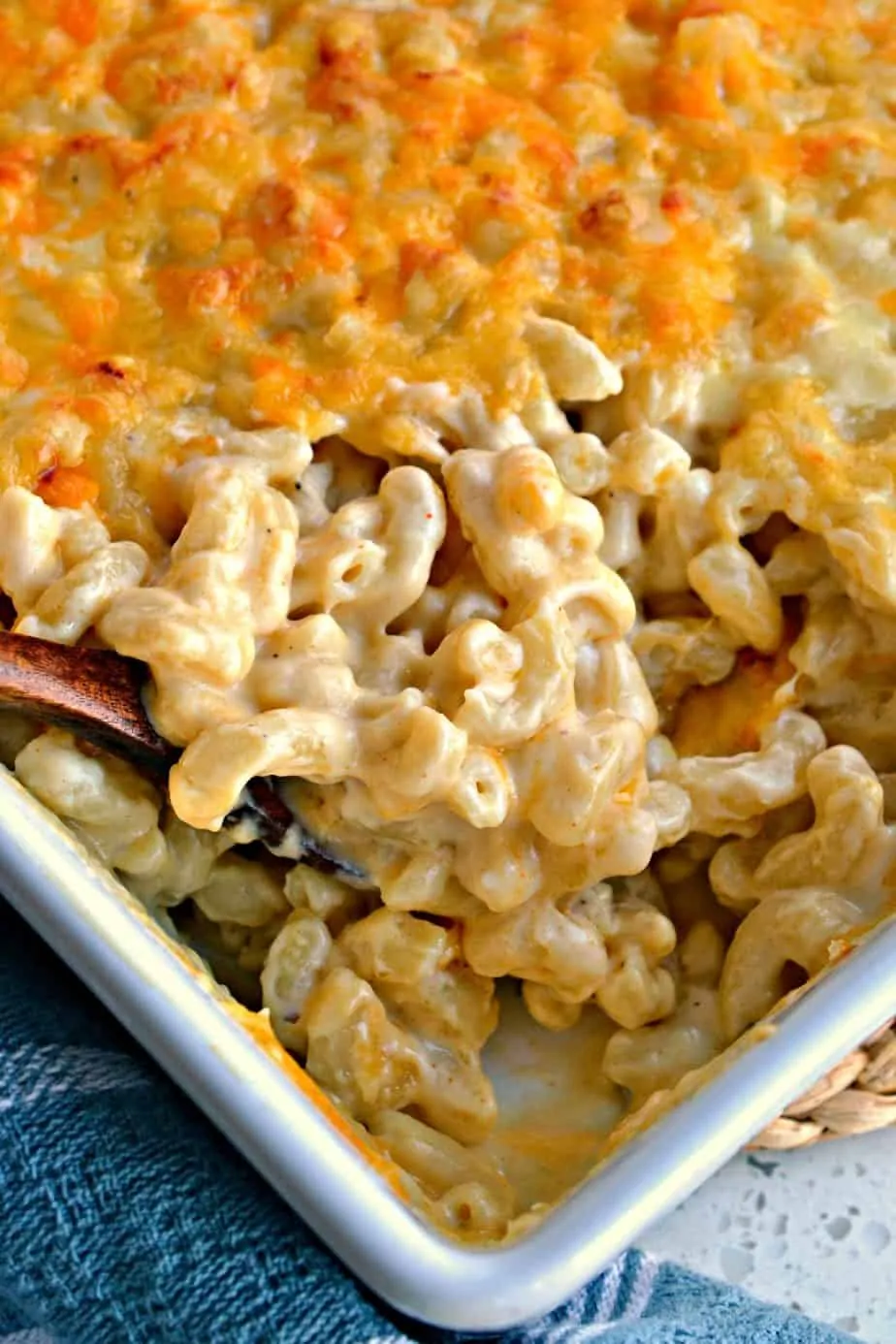 This Baked Macaroni and Cheese is over the top heavenly creamy with oodles of the perfect blend of cheeses.