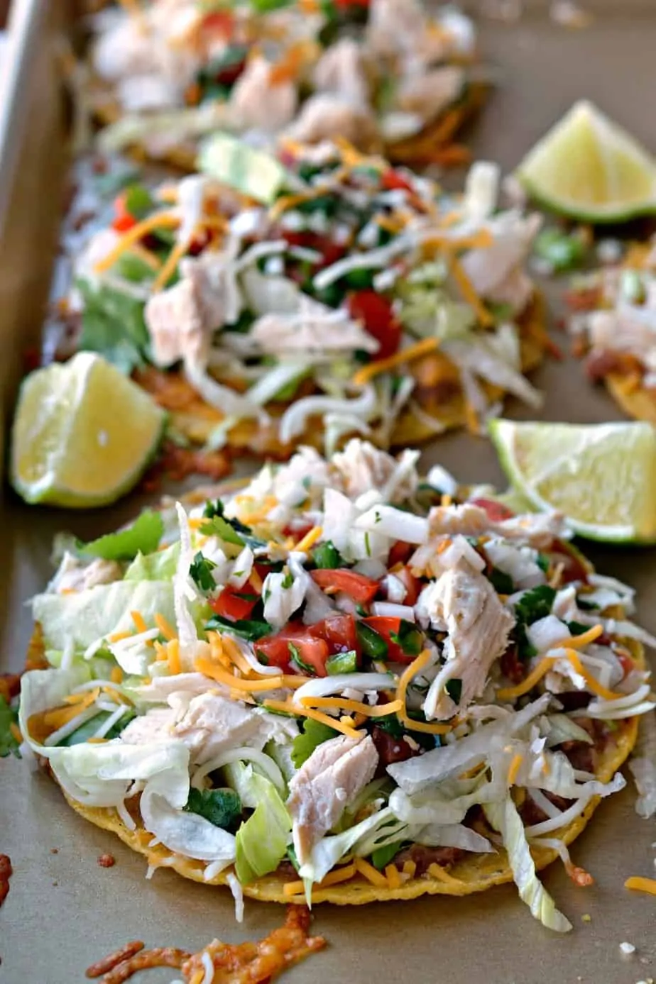 These easy Chicken Tostadas are a cinch to put together using ready to go tostada shells and rotisserie chicken.