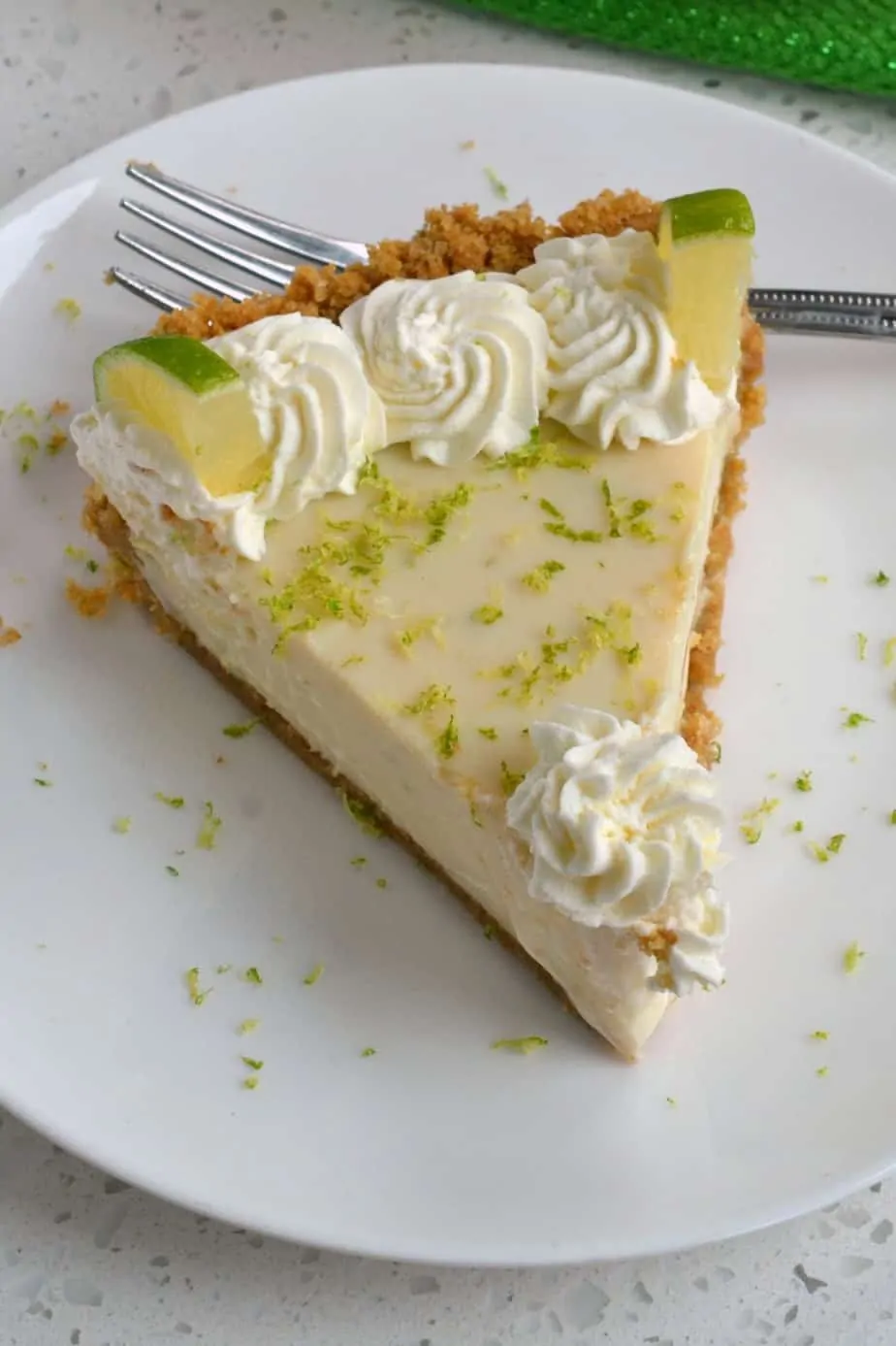 With a four ingredient crust and four ingredient filling this key lime pie comes together quickly and easily. 