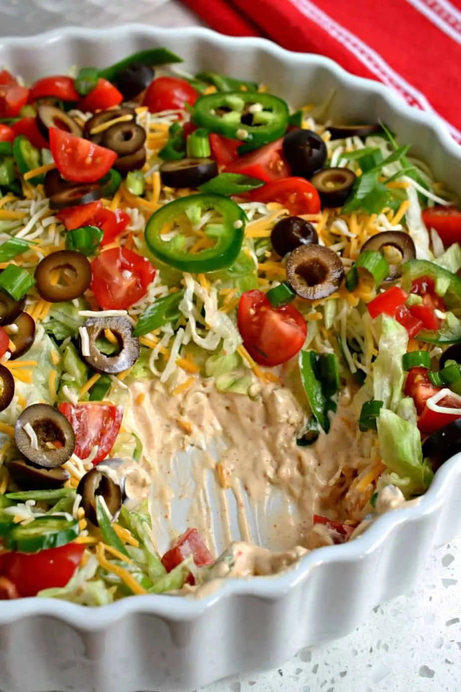 This Taco Dip is always a huge hit at potlucks, family reunions and holiday parties. 