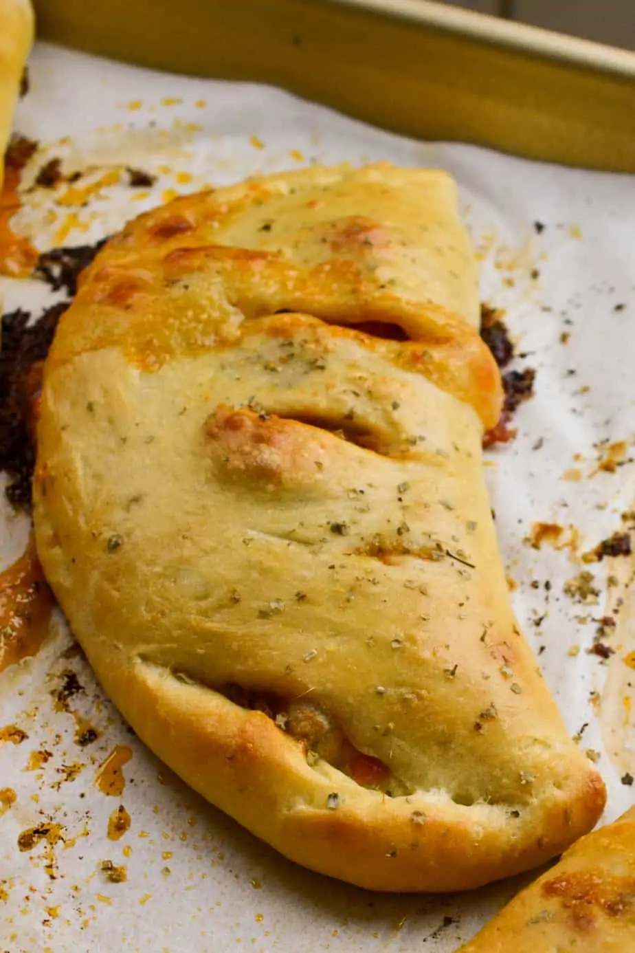 This easy to make Homemade Calzone Recipe makes fresh baked hot pockets of marinara, pepperoni and melted mozzarella. 