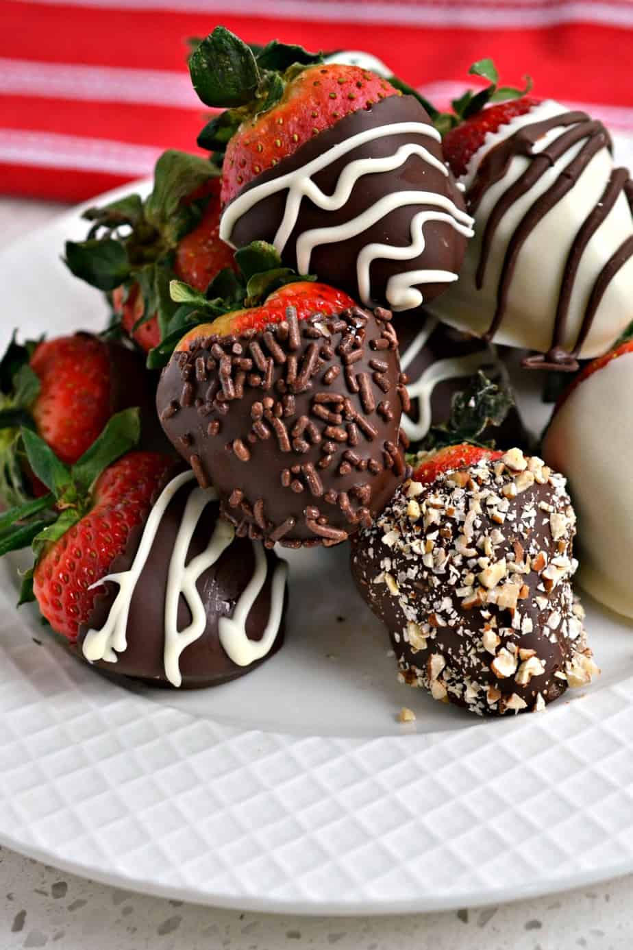 Delectable and gorgeous this easy Chocolate Covered Strawberries can take your dessert and candy trays to a whole new level.