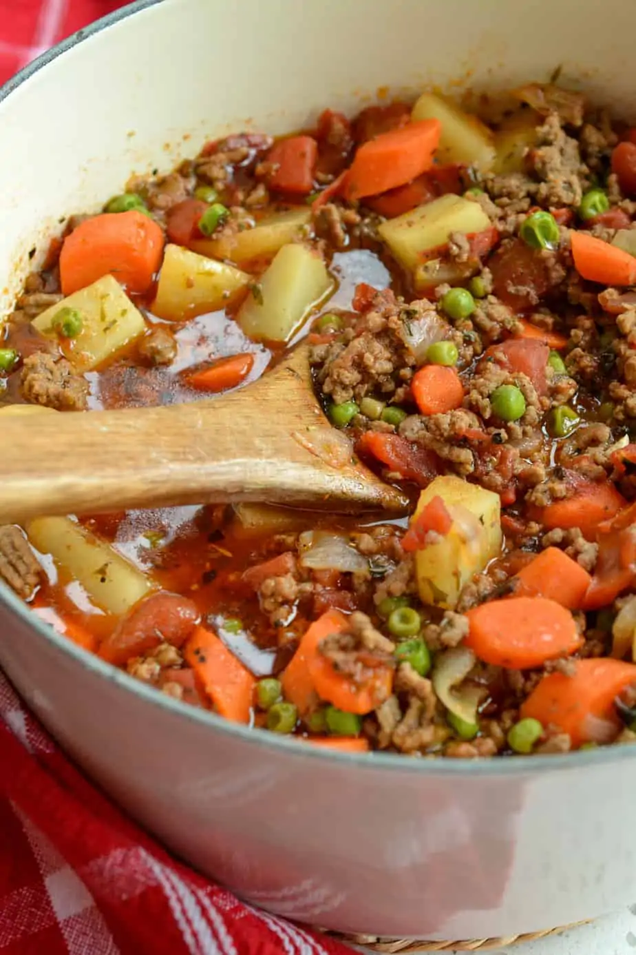 Old fashioned hamburger stew is made in about forty minutes with ground beef, fresh vegetables and a easy blend of spices