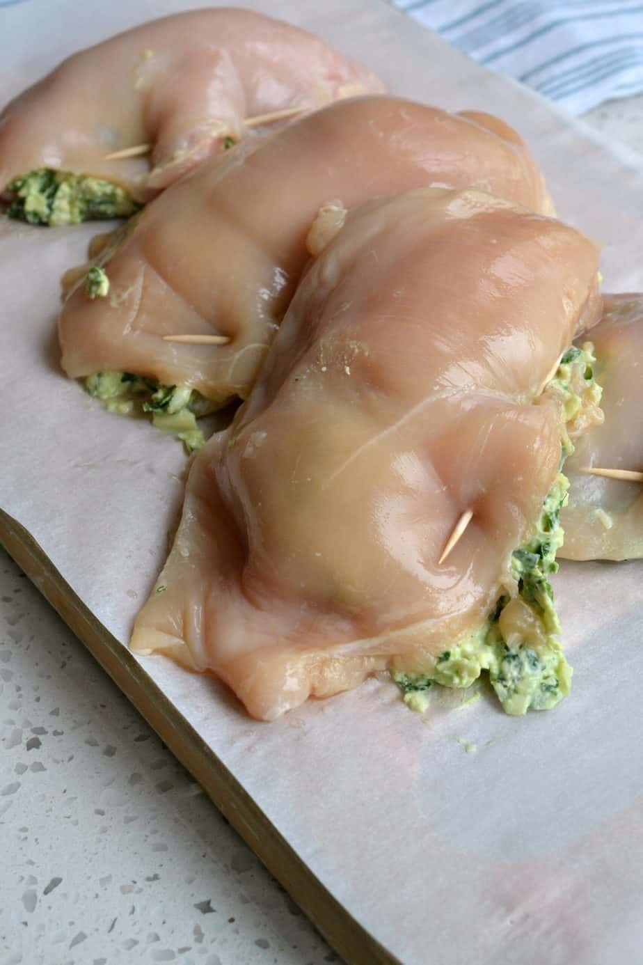 Spinach Stuffed Chickens breasts are elegant enough for company yet easy enough for a weeknight. 