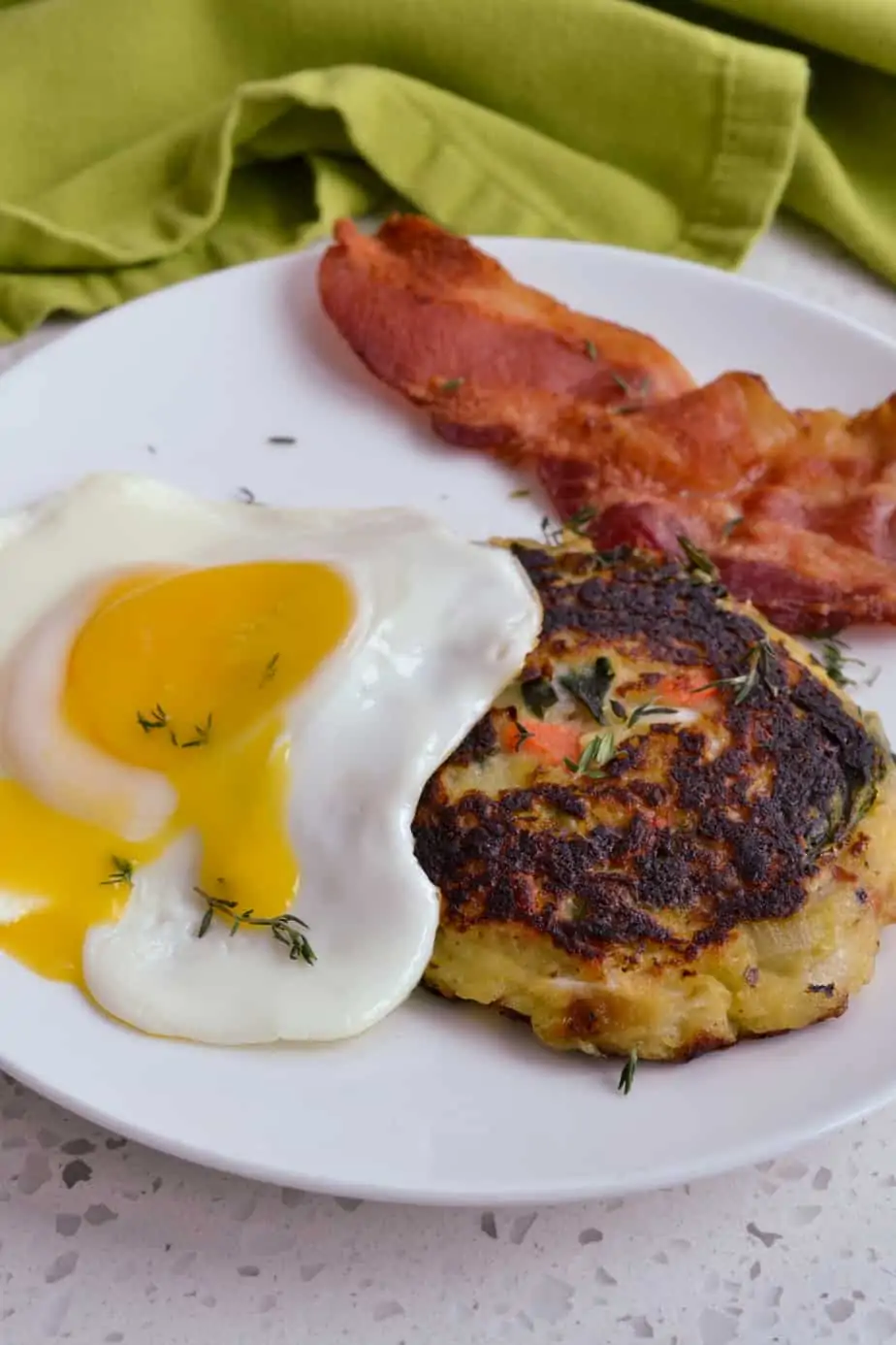 Top the potato pancakes with a sunny side up or poached egg. 