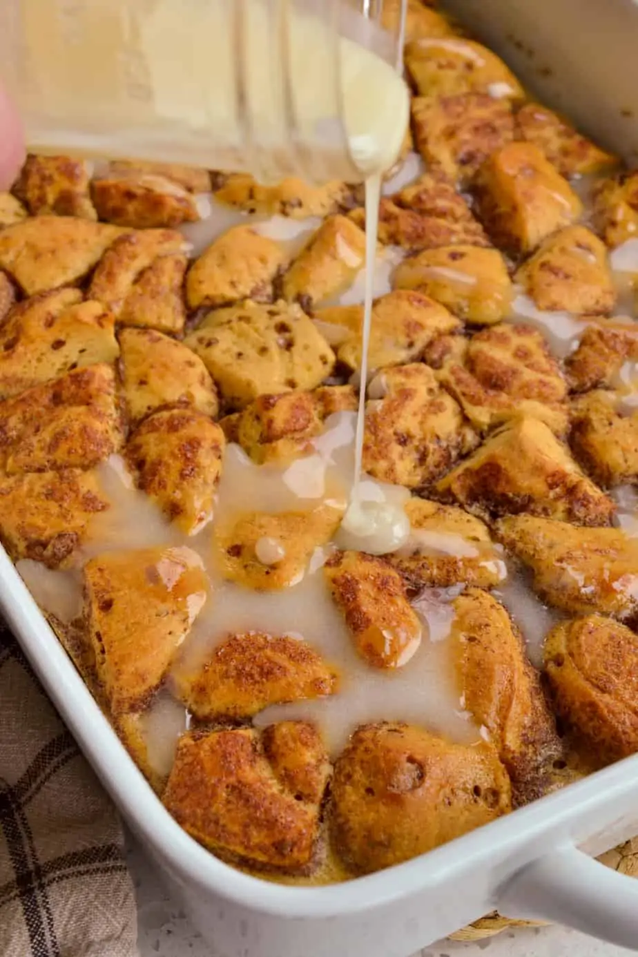 Cinnamon roll french toast bake drizzled with warm icing. 