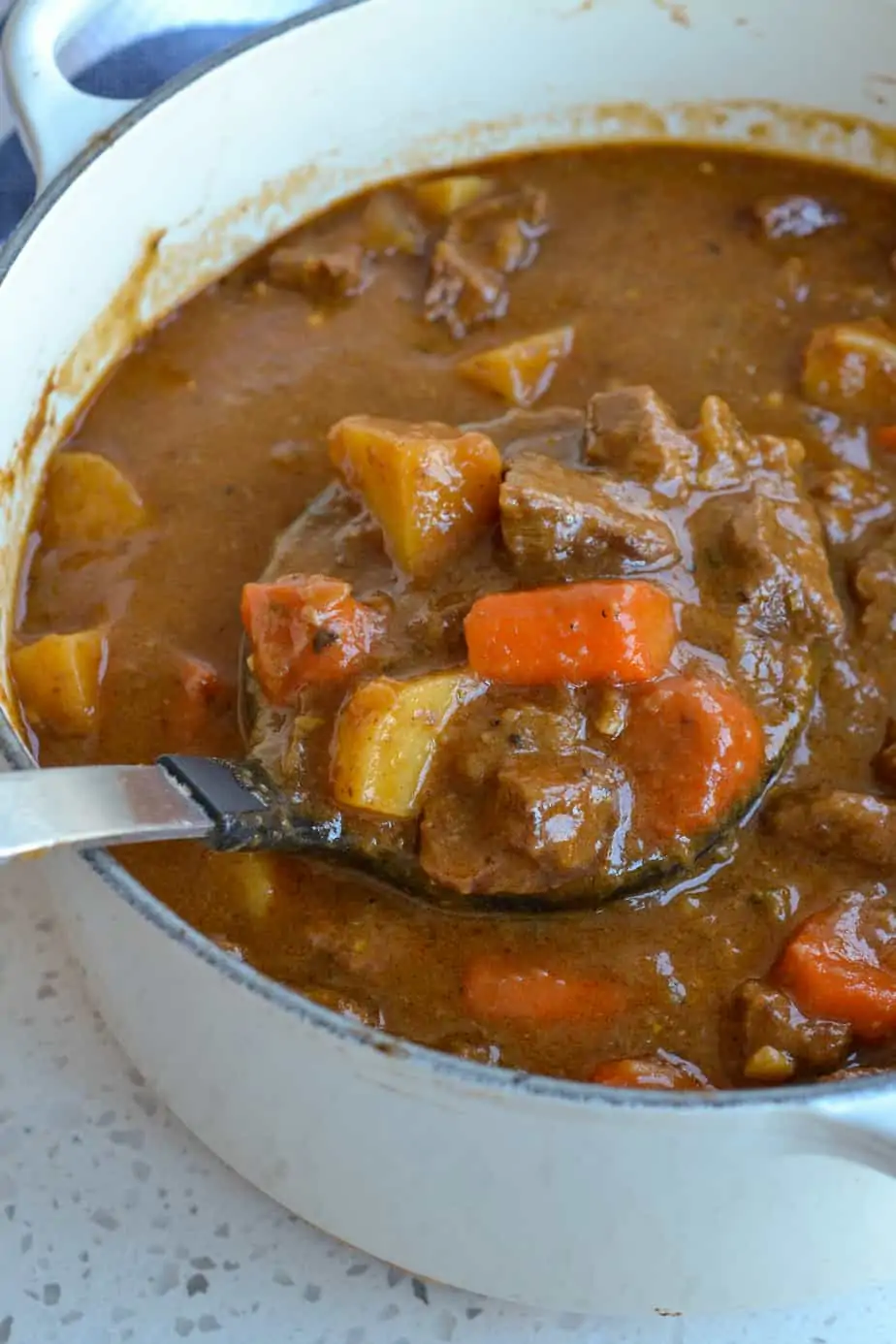 A warm rich and flavorful beef stew with onions, potatoes, and carrots. 