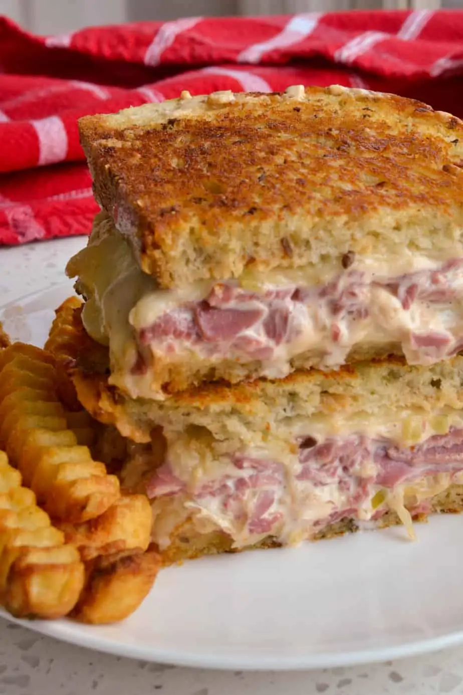 Toasted corned beef, Swiss cheese, and sauerkraut sandwich. 
