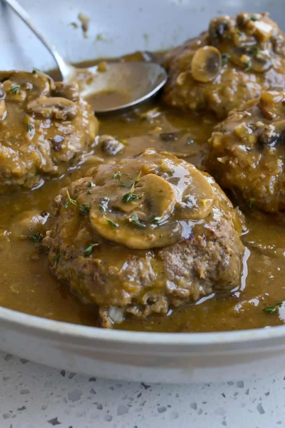 Easy to make tender beef patties with a creamy homemade mushroom gravy. 