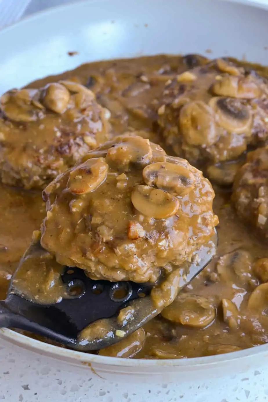 A quick and simple recipe for tender beef patties with mushroom gravy. 