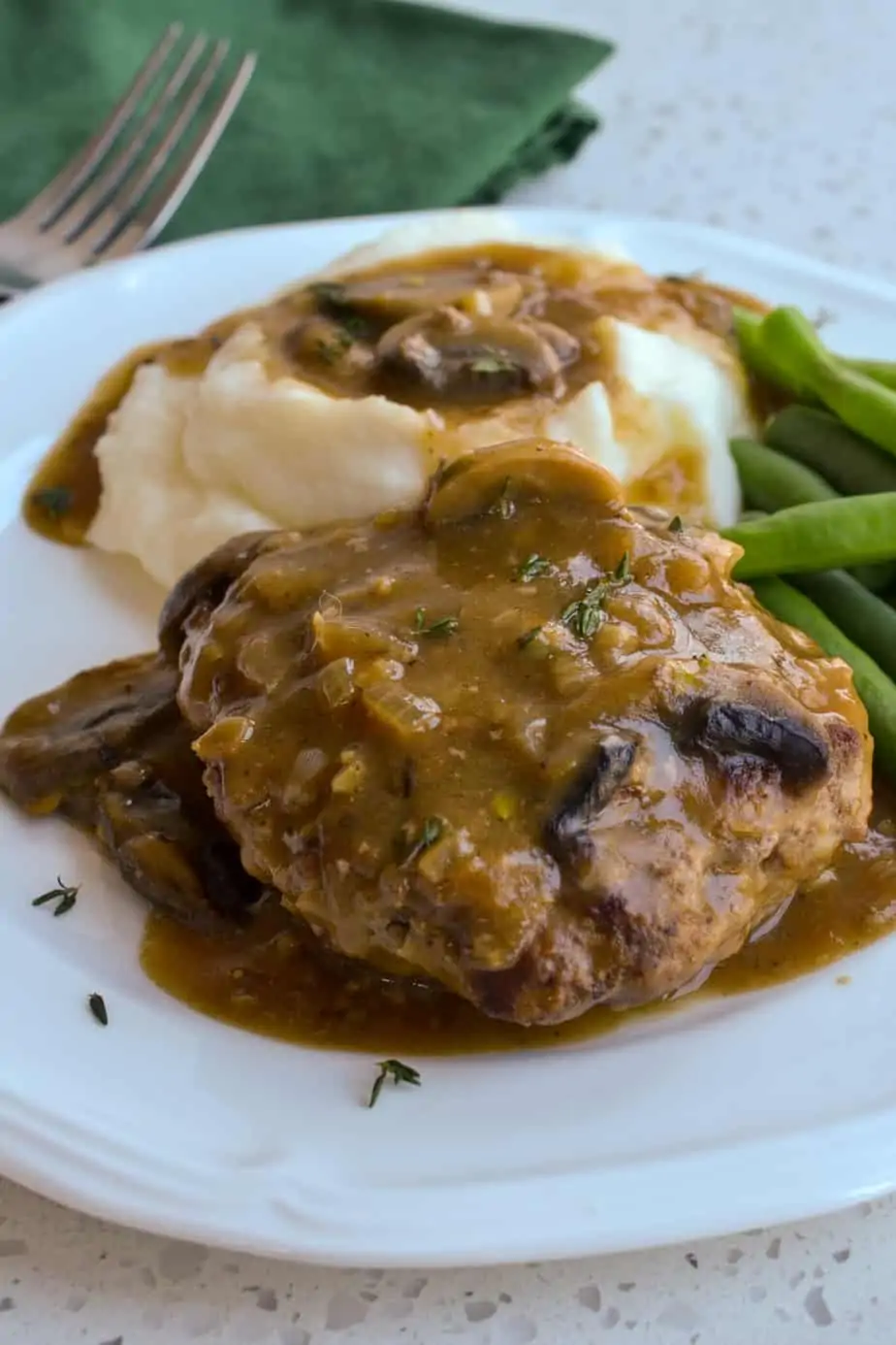 Tender beef patties with rich mushroom gravy. 