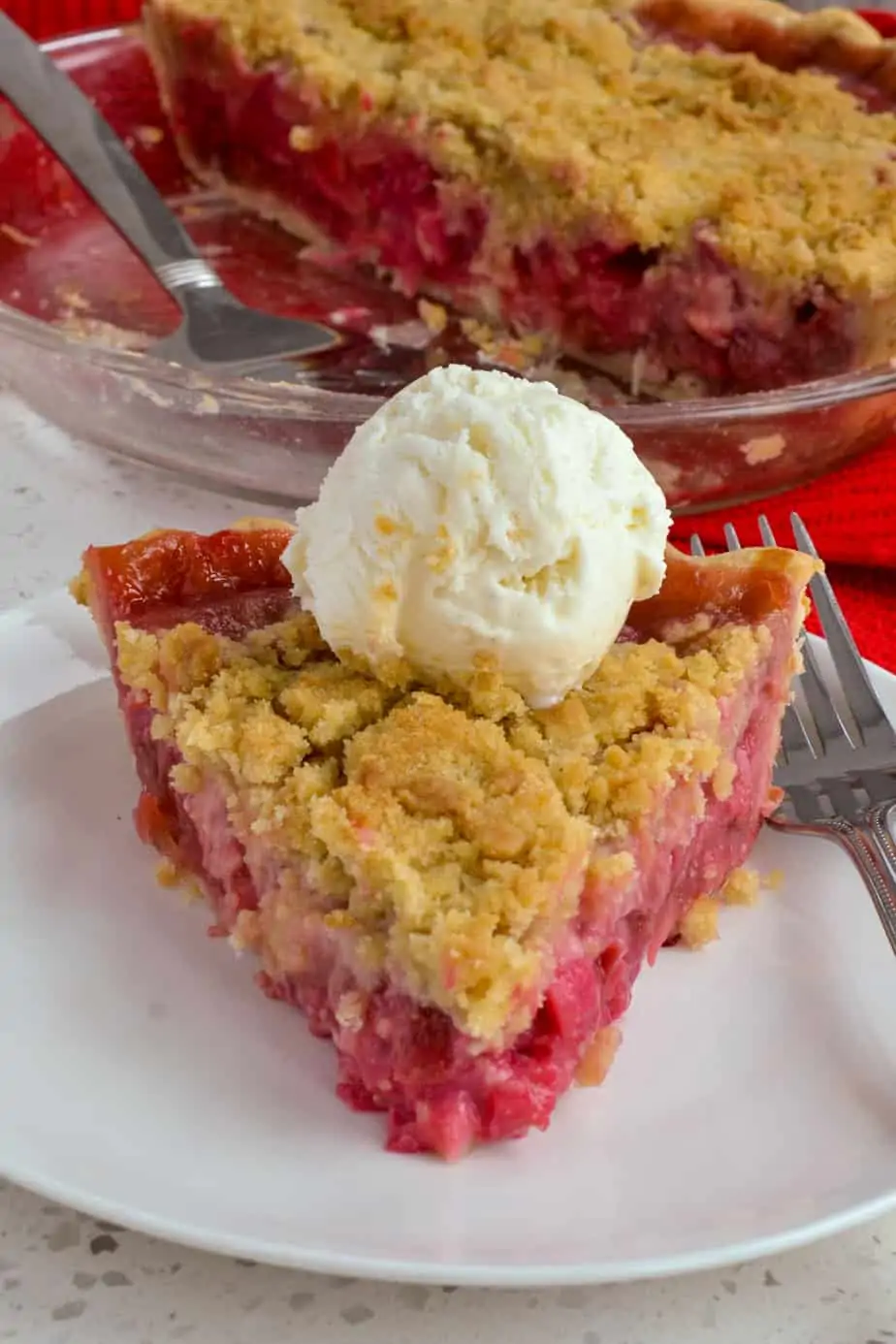 Homemade strawberry and rhubarb pie with an easy crumb topping