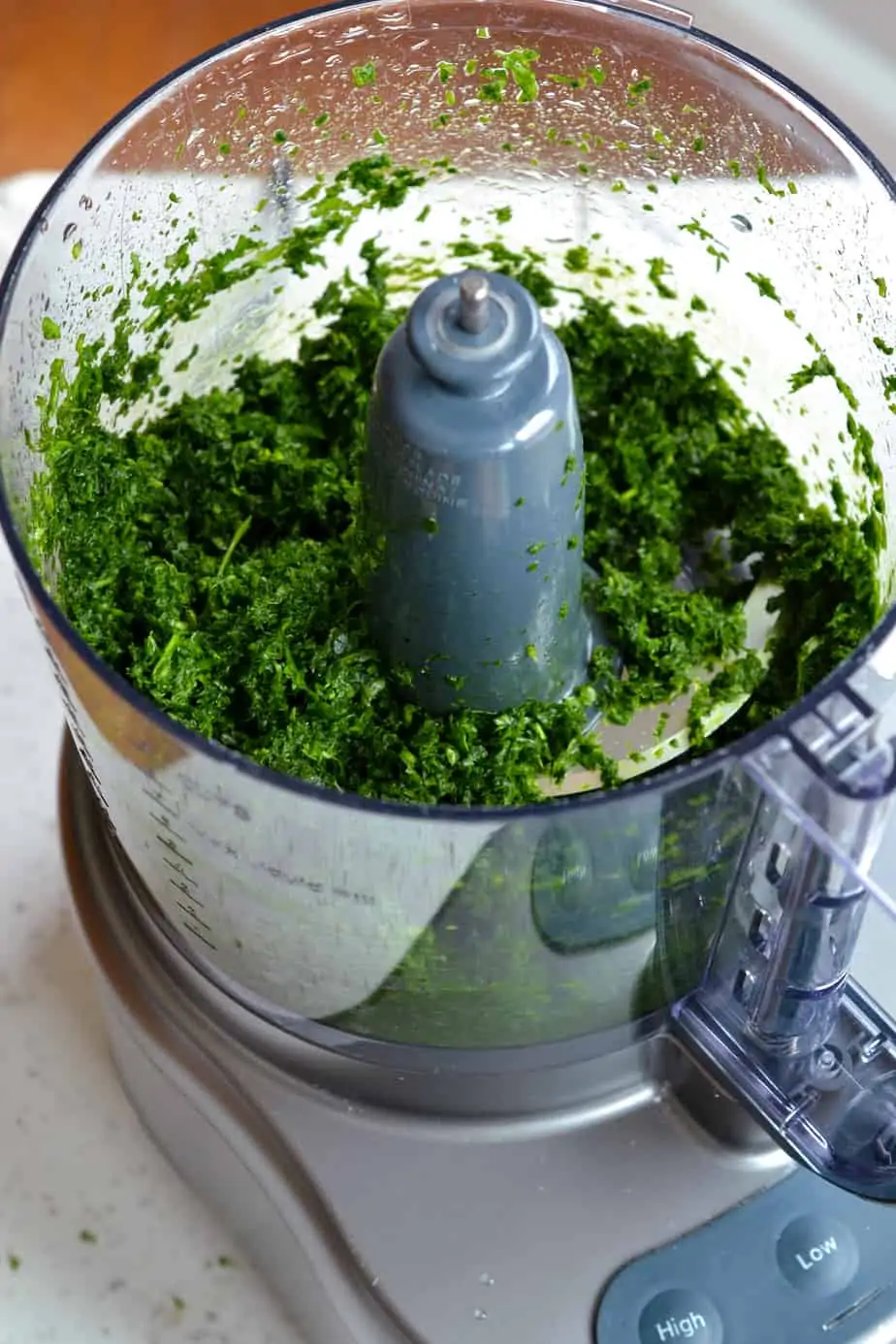 Fresh parsley chopped up in a food processor