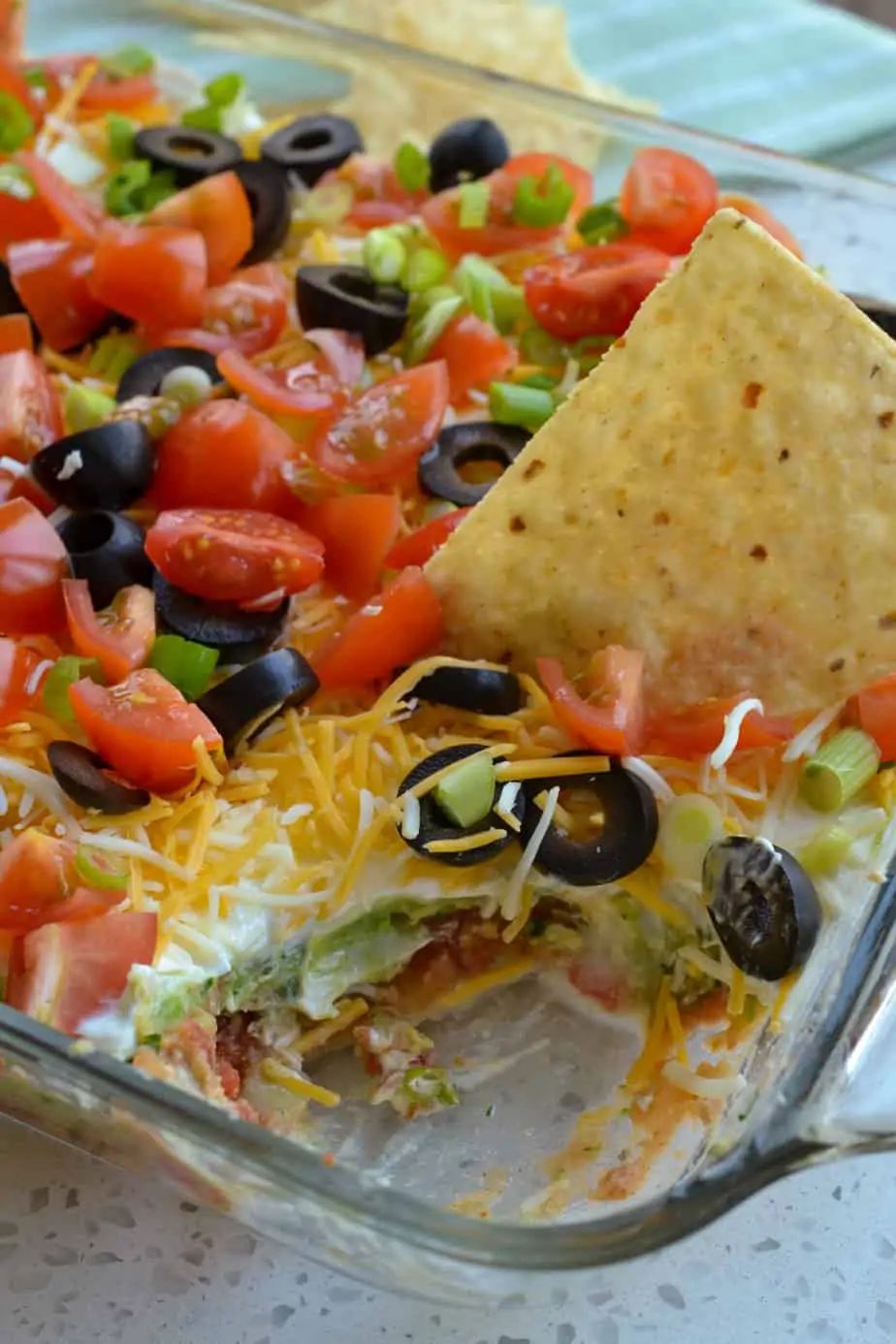 Enjoy this layer dip with tortilla chips. 