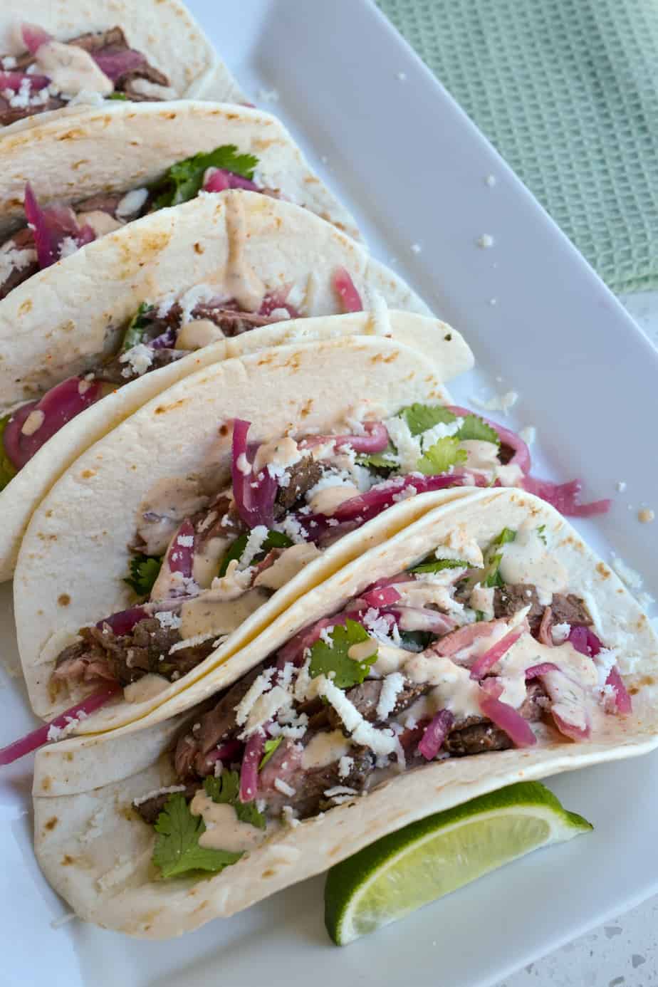 A plate of carne asada street tacos.