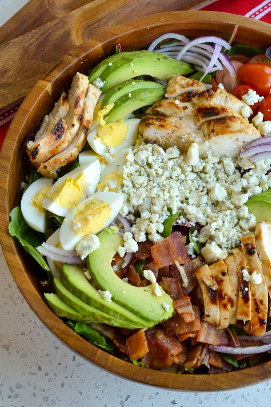 Cobb Salad with avocado, grilled chicken, hard-boiled eggs and bacon. 