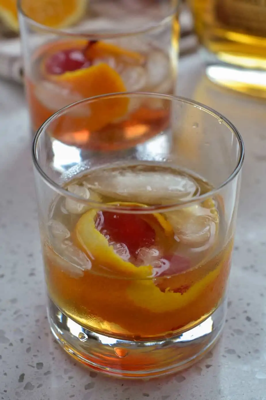 Old fashioned cocktail on ice
