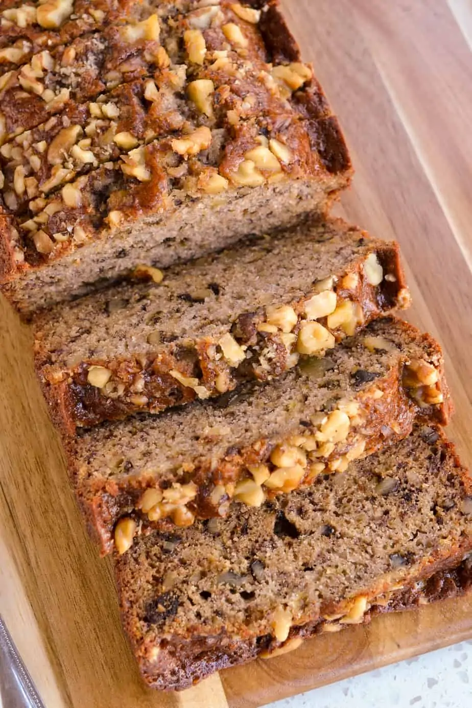 Slices of moist banana bread with walnuts