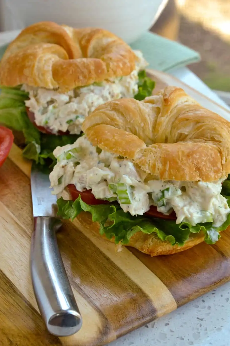 Creamy chicken salad on a croissant.