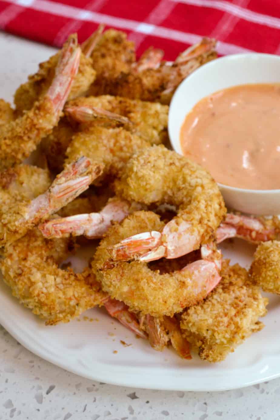 Breaded shrimp with comeback sauce.