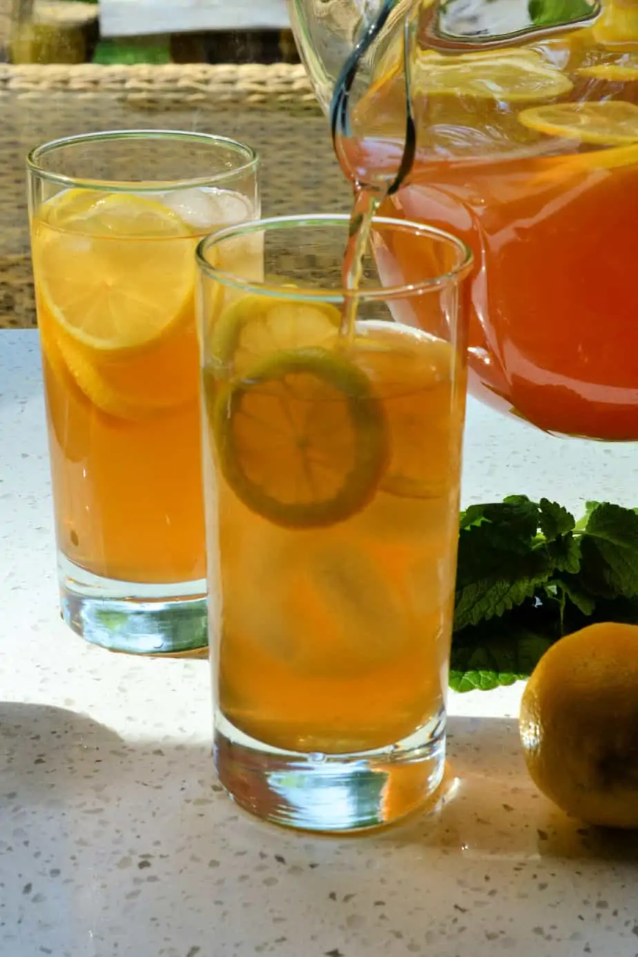 A pitcher of tea mixed with lemonade. 