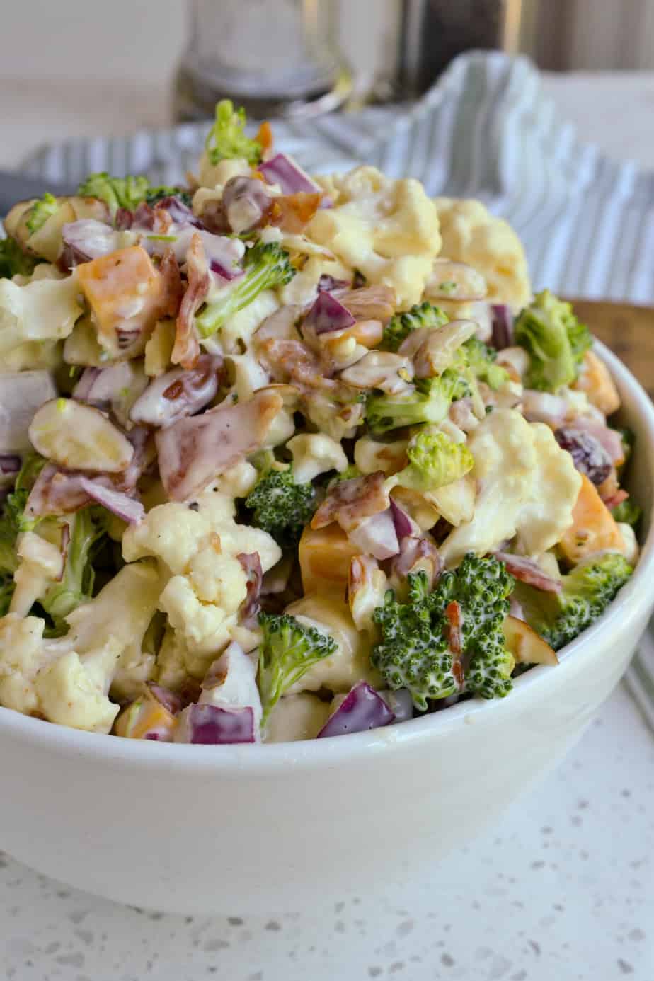 A bowl of Creamy Broccoli Cauliflower Salad