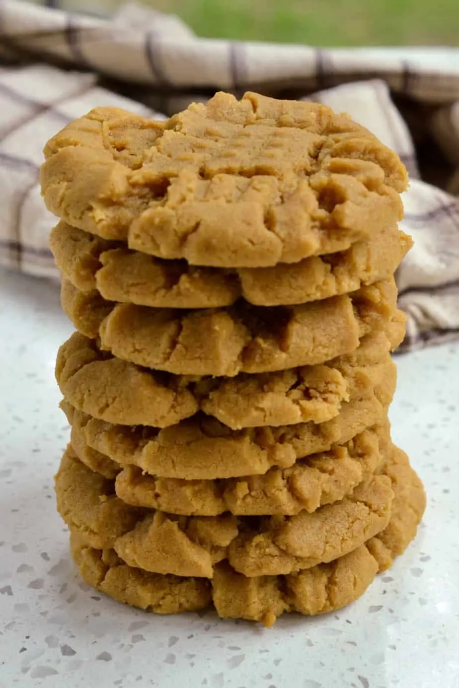A stack of flourless peanut butter cookies