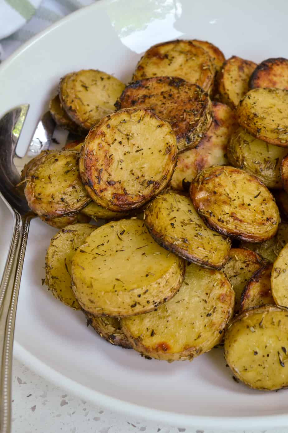 A bowl of grilled herb potatoes