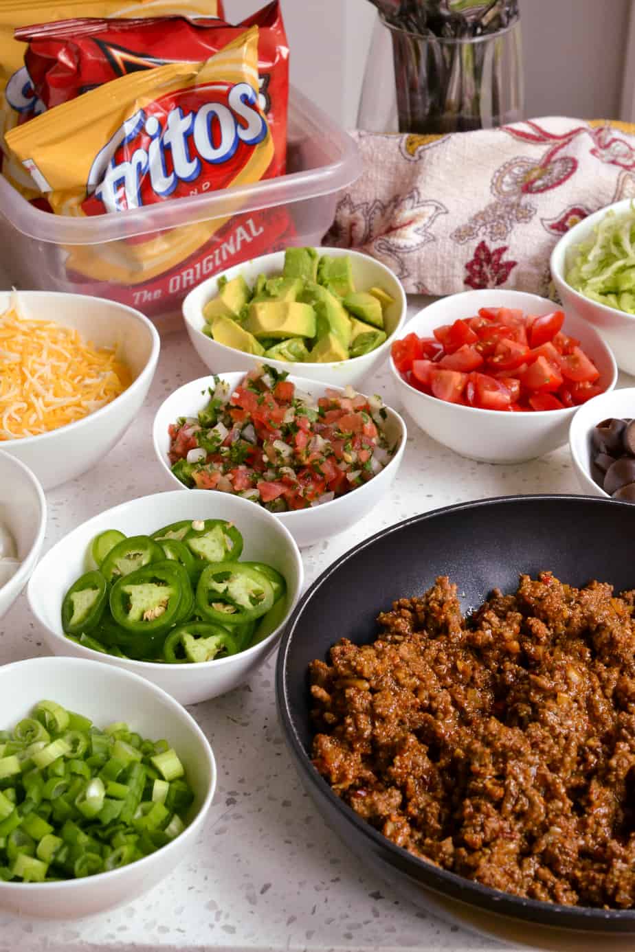 Walking taco bar with assorted toppings