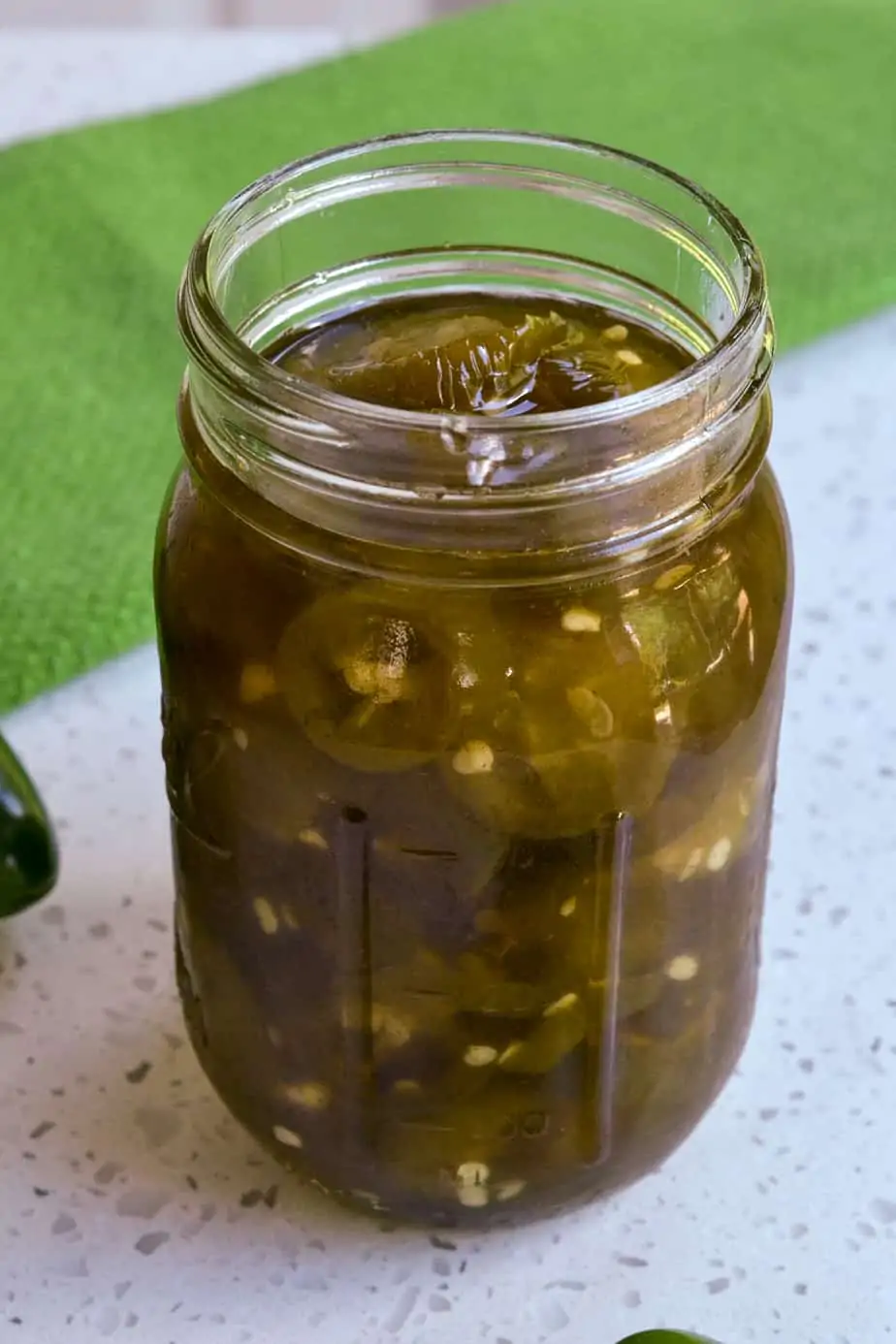 A canning jar full of cowboy candy. 