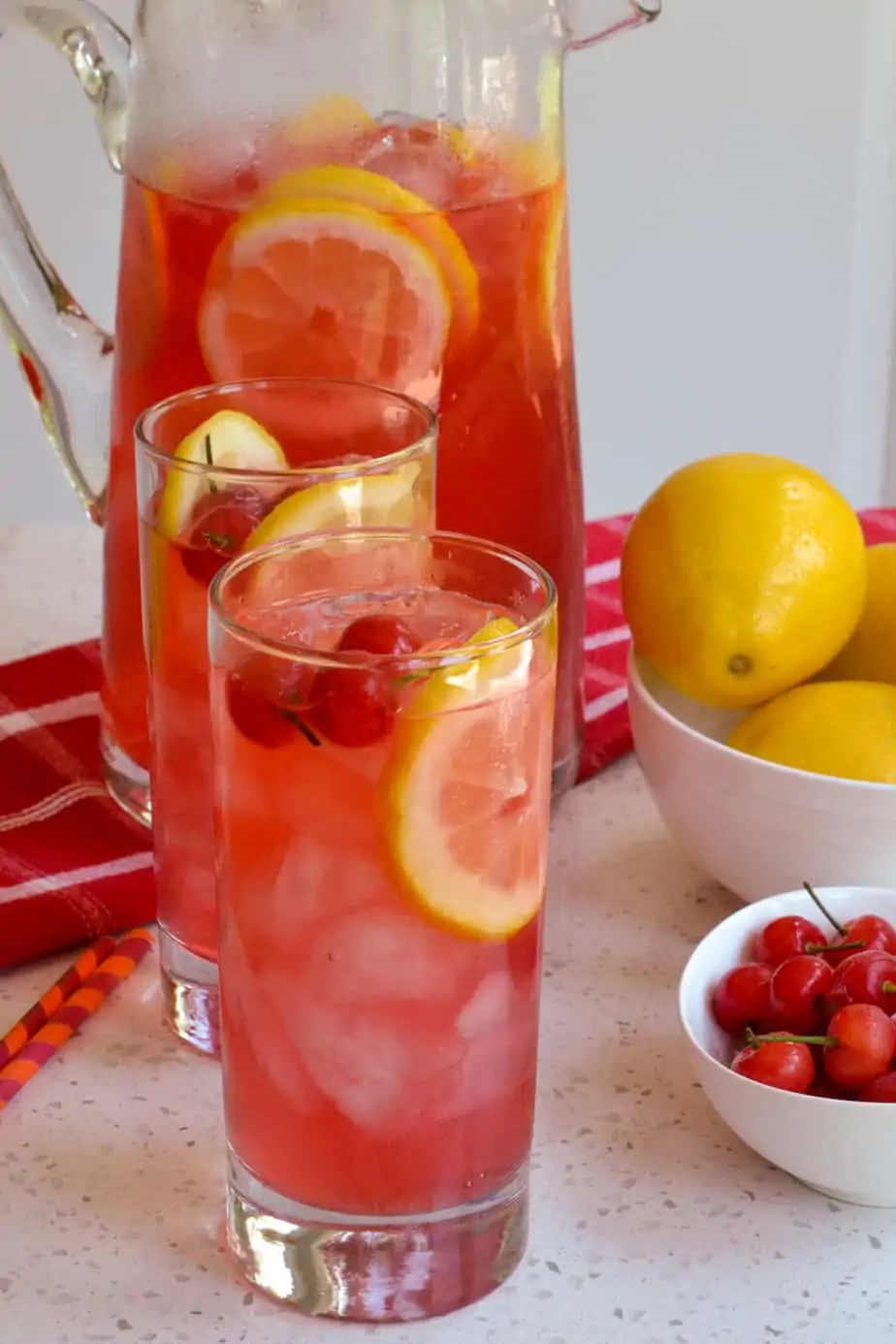 An easy fresh Cherry Lemonade recipe made from sour cherries and fresh lemons.  This refreshing beverage is perfect for all your summer barbecues and picnics.