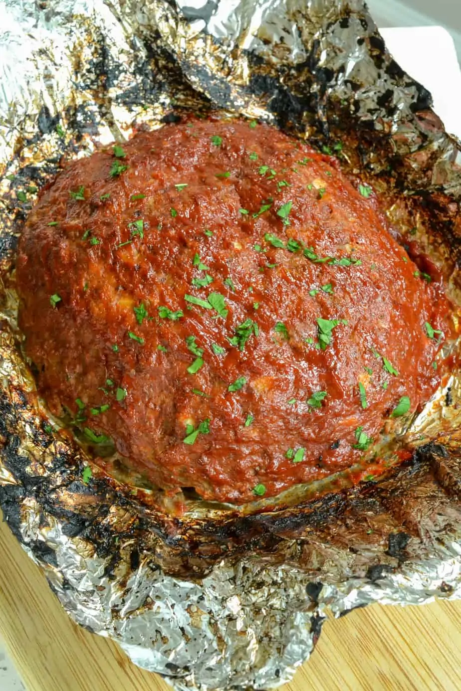 Slow cooker meatloaf on a piece of foil. 