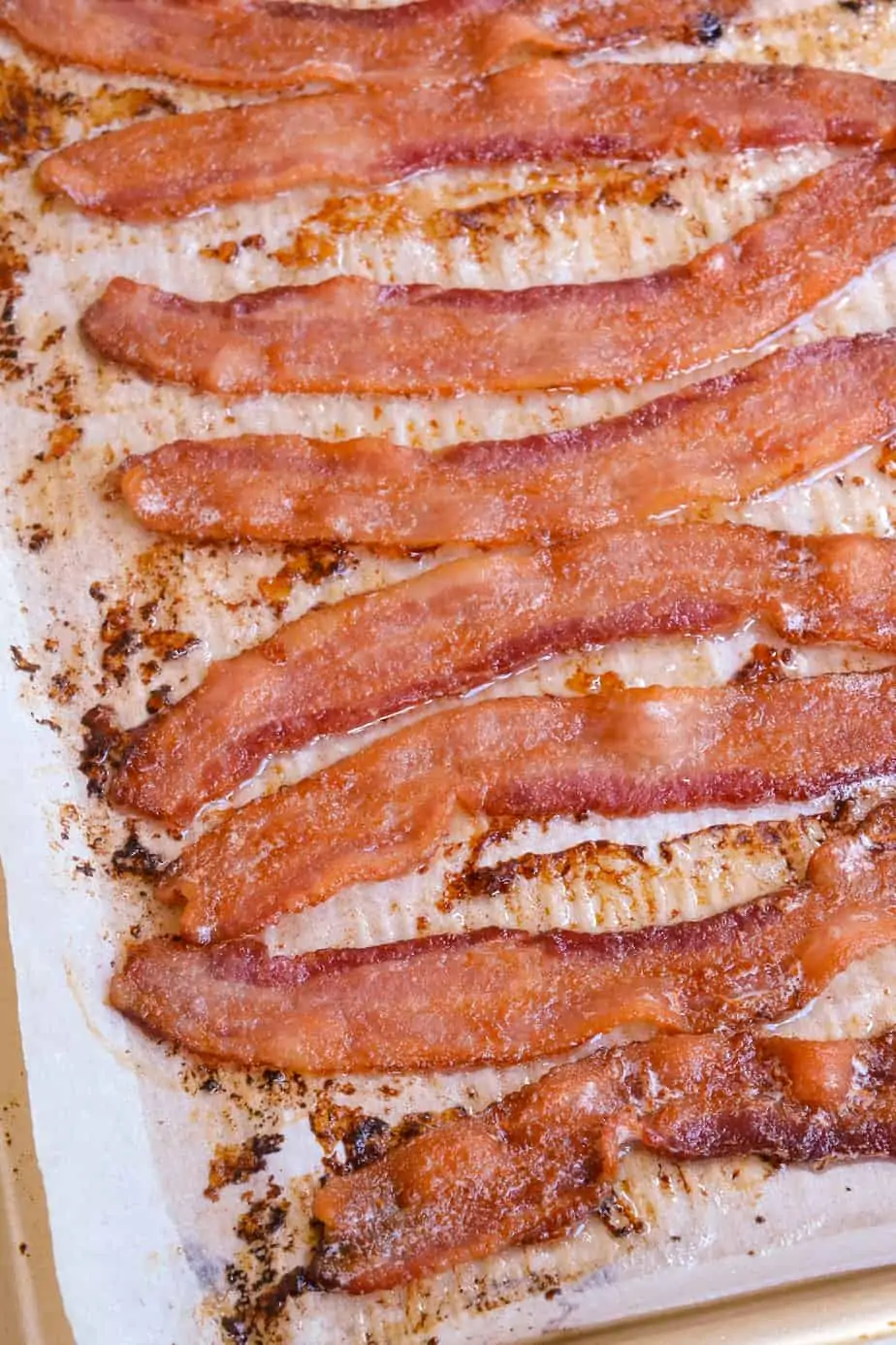 A baking sheet full of crispy cooked oven bacon. 
