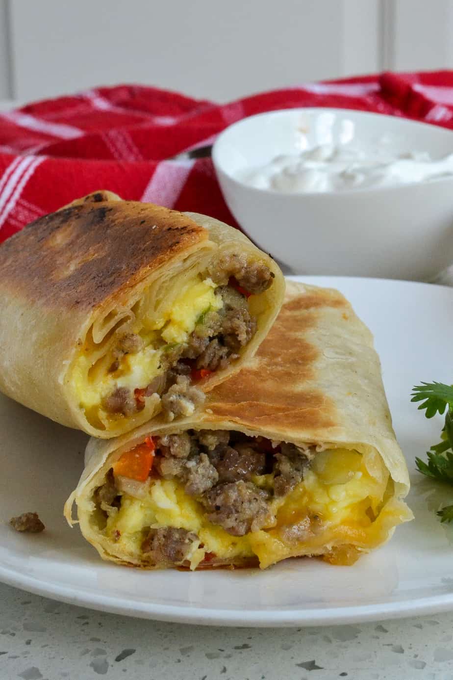 Breakfast burritos with eggs, sausage, and cheese. 
