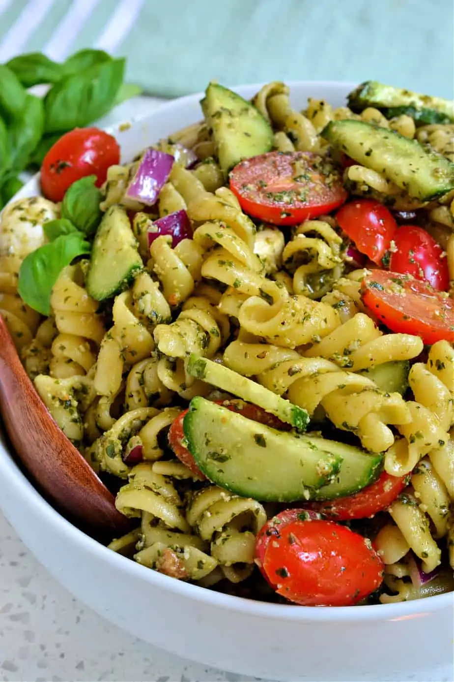 A bowl full of Pesto Pasta Salad