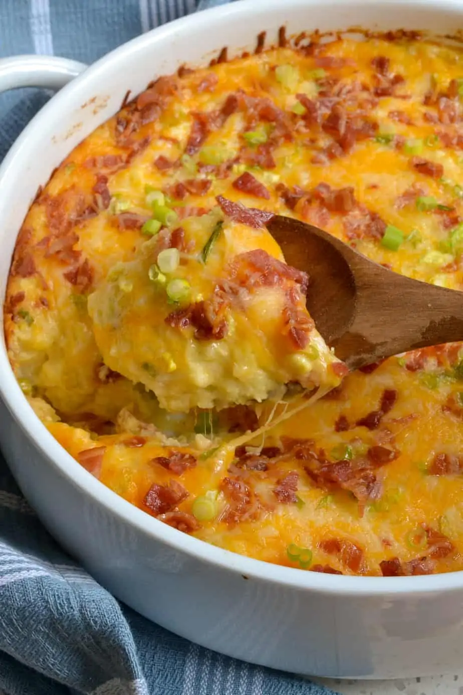 A large spoonful of twice baked potato casserole, 