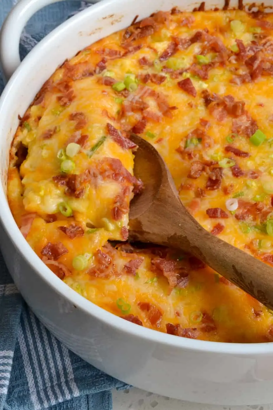 A casserole dish full of twice baked potatoes