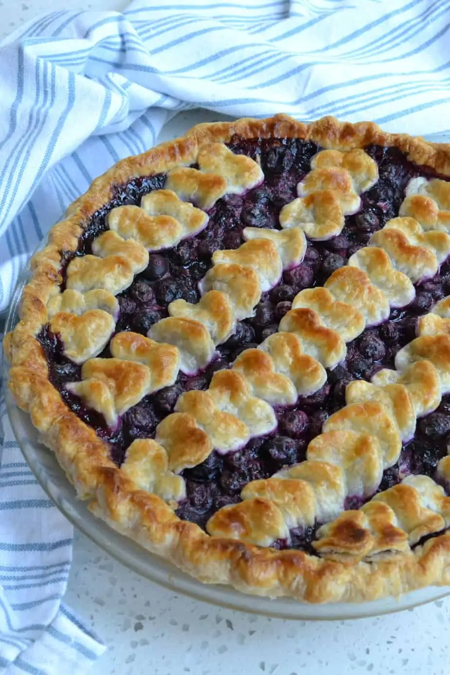 A fresh blueberry with a cookie cutter heart crust. 
