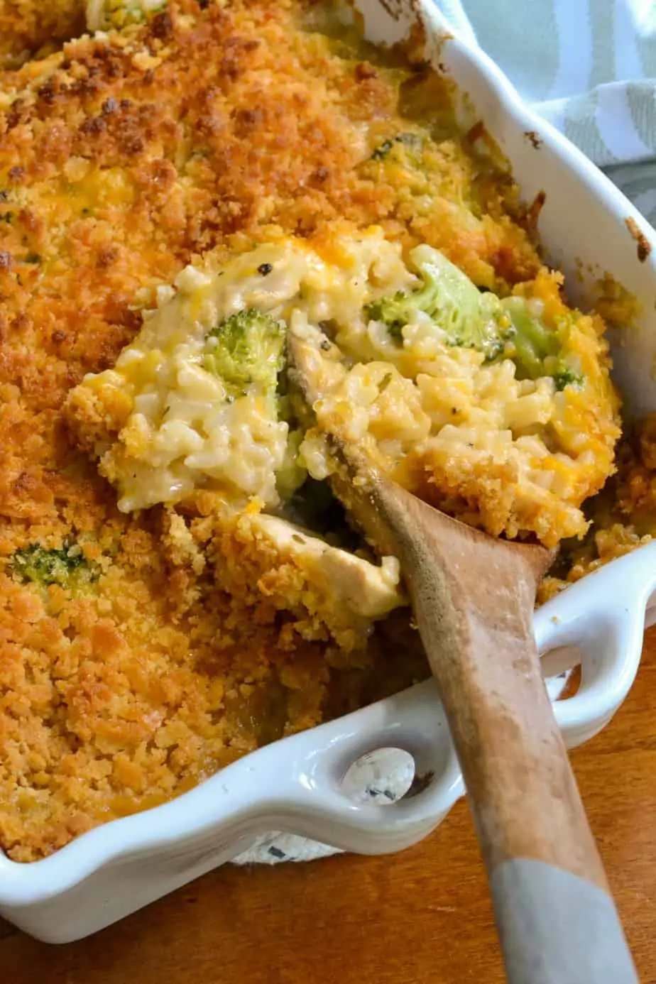 A casserole full of chicken, broccoli, rice, and cheese. 