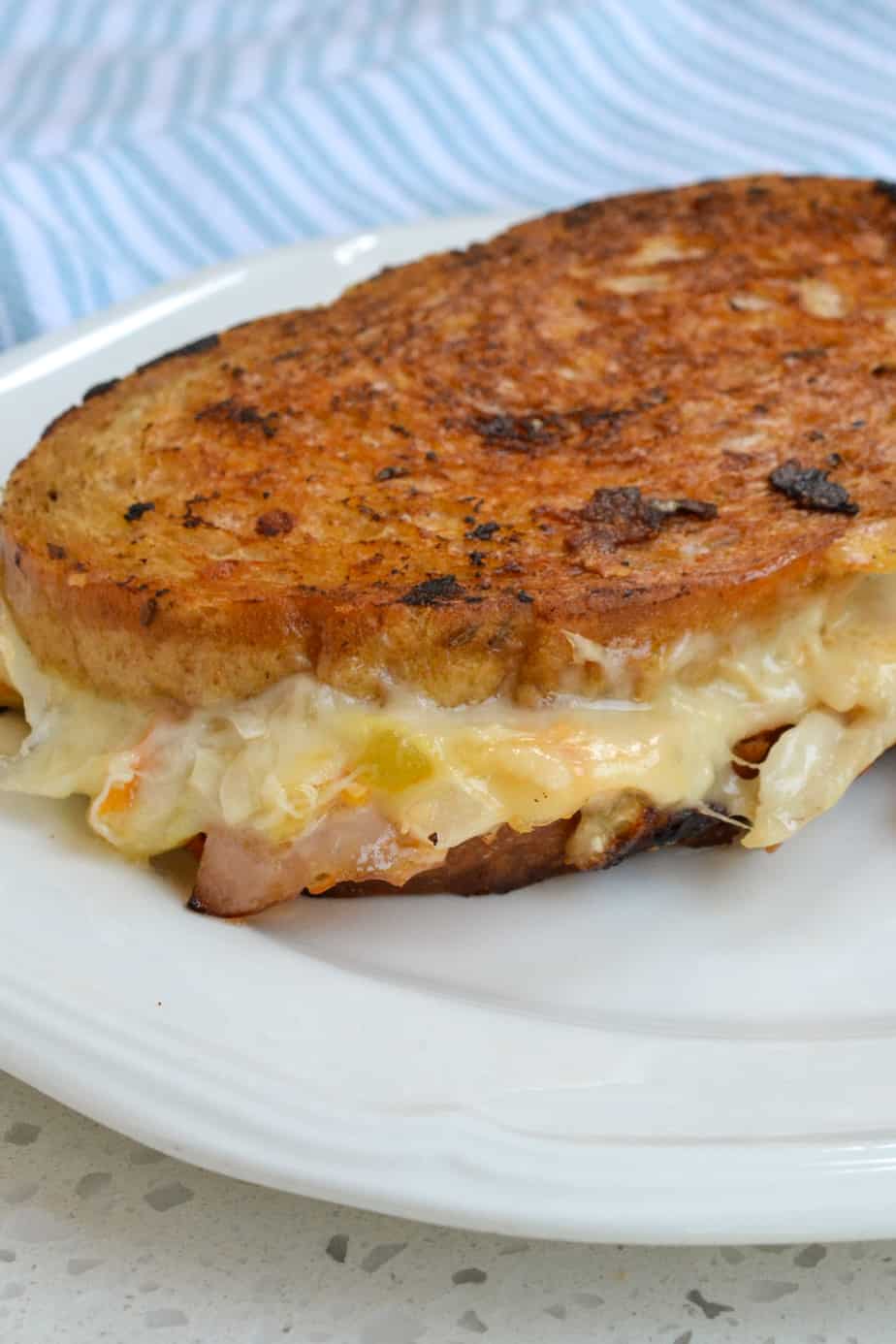 A hot grilled sandwich with turkey, Swiss, coleslaw, and thousand island dressing. 