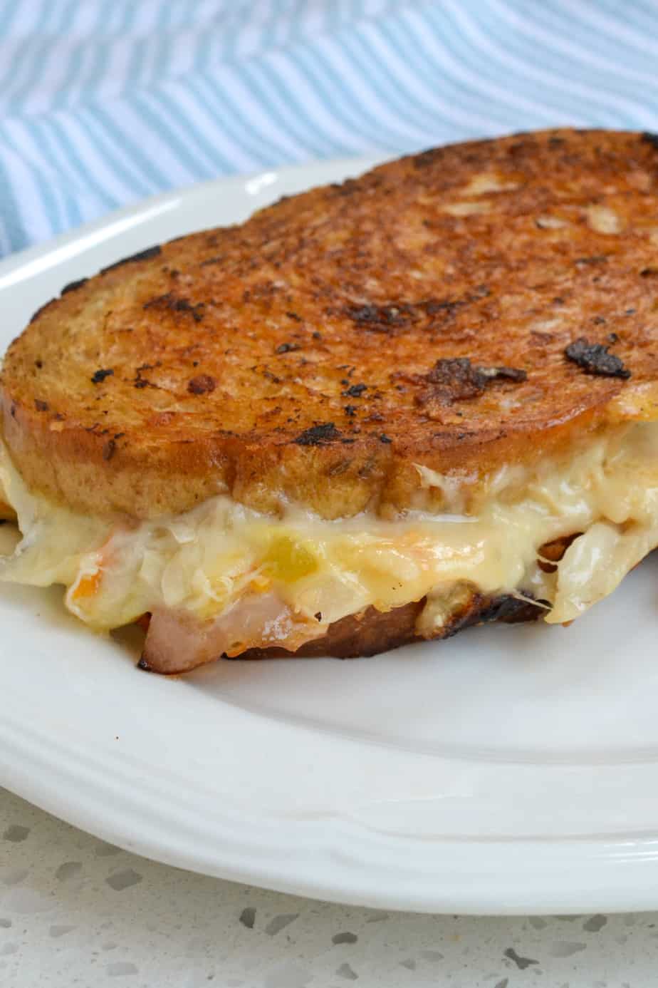 A hot grilled sandwich with turkey, Swiss, coleslaw, and thousand island dressing. 