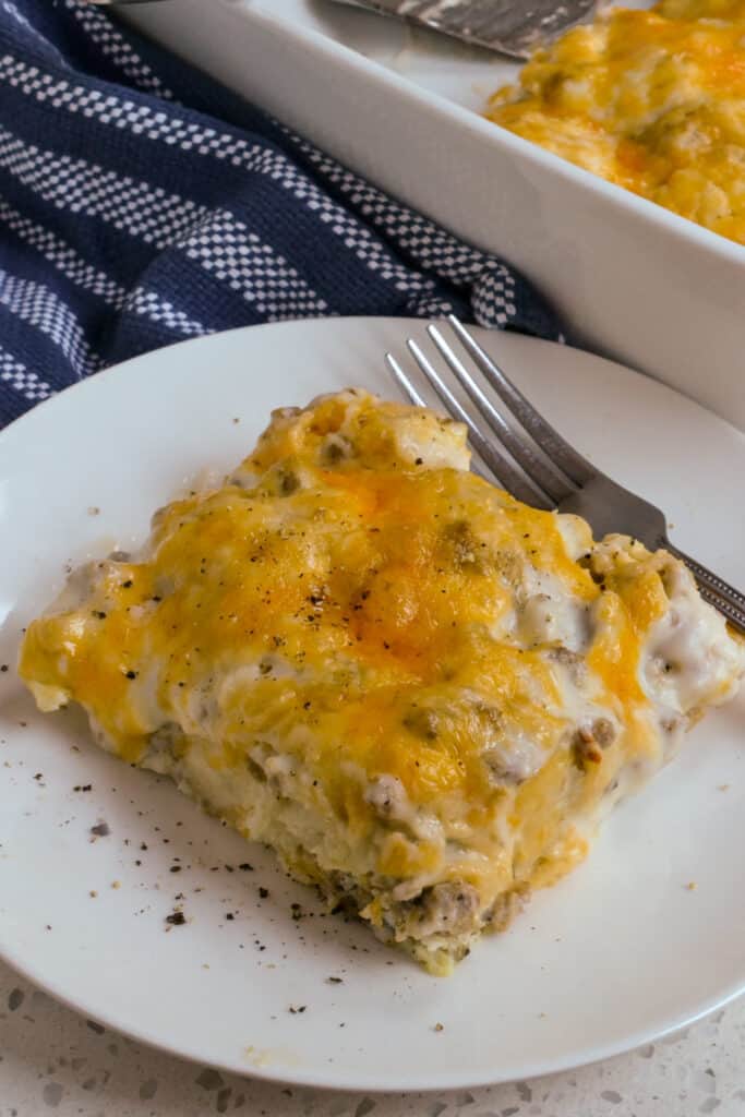 A serving of cheesy biscuits and gravy casserole. 