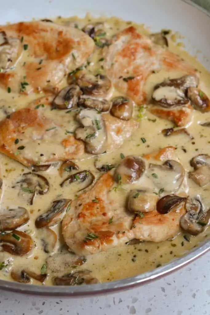 Browned chicken and mushrooms in a creamy sauce. 