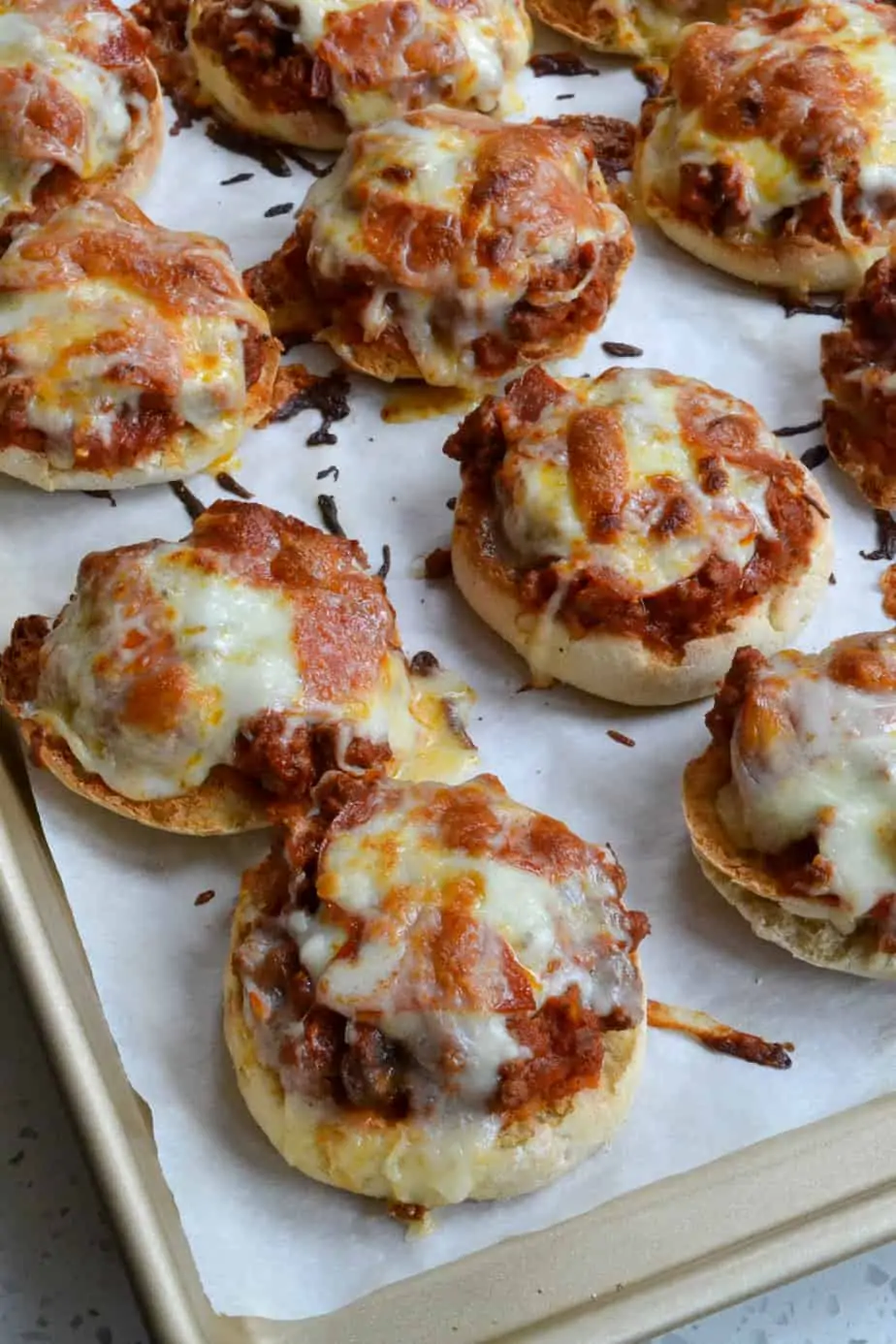 Pizza Burgers with ground beef, pepperoni, mushrooms, and mozzarella. 